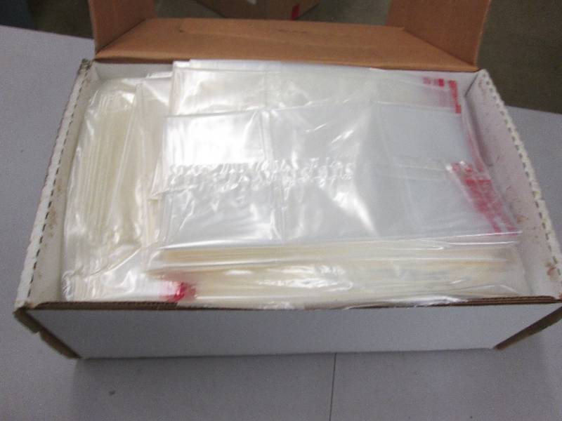 lot 248 image: Case Large Plastic Bags 250cs 13x8...