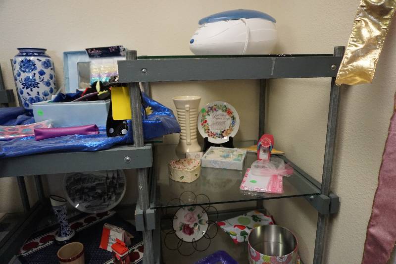 2 Sections of Metal and Wood Framed Shelving With Glass Tops