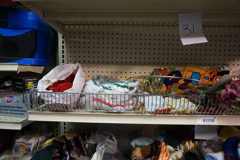 Lot of Assorted Cloths Hangers Hot Pad Holders and Artificial Flowers
