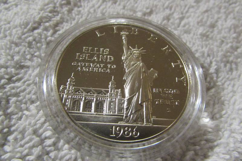 1986-S LIBERTY ELLIS ISLAND COMMEMORATIVE SILVER DOLLAR