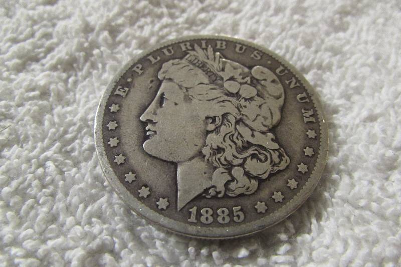 1885-O MORGAN SILVER DOLLAR, 90% SILVER
