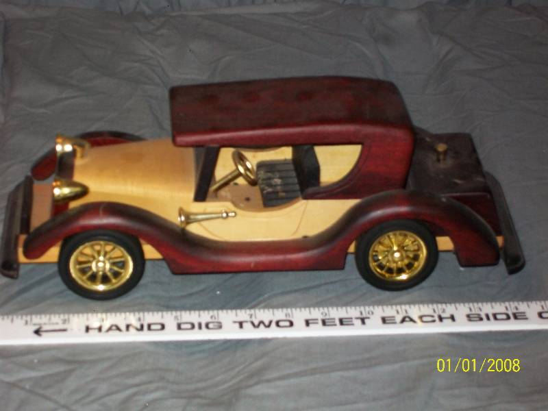 lot 32 image: Exquisite Multi Wooden Touring Model Car with Rubber Wheels & Opening Trunk, 15 long