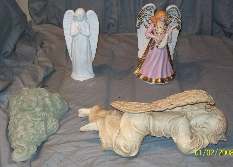 lot 37 image: 4 Angel Figurine Statues IncludesSleeping Shelf Angel Music Box AMC NY Angel Dept 56 MAM Cornucopia