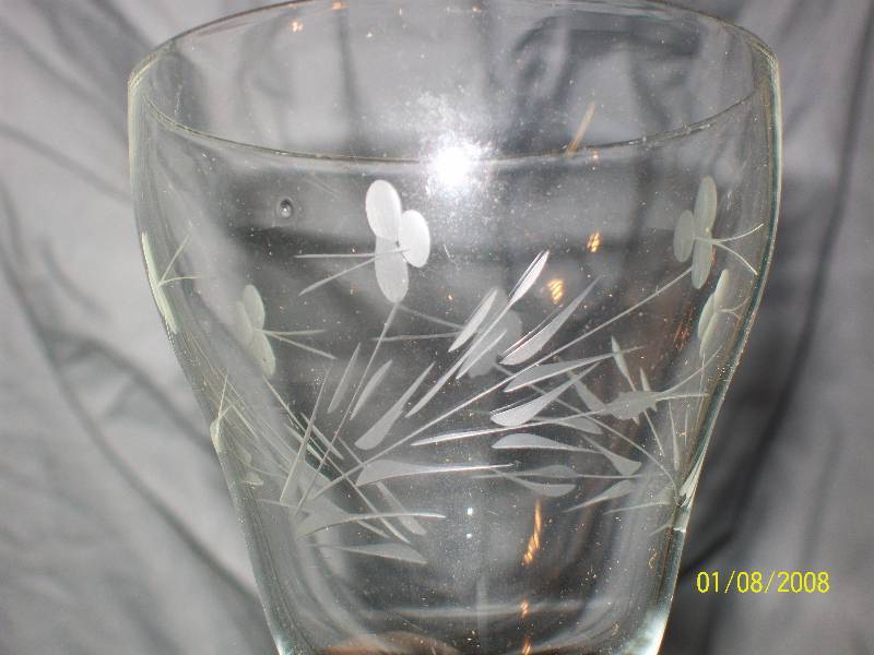 lot 41 image: 35 Piece Elegant Stemware with Swirling Frosted Clover design on Bowl with Clear StemBase.