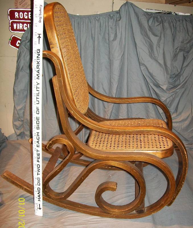 lot 45 image: Vintage Collectible Bent Wood Wicker Rattan Cane ChildKidYouth Rocking Chair.