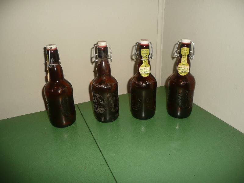 LOT Of 4 VINTAGE BROWN GLASS GROLSCH LAGER BEER BOTTLES WITH LABELS & PORCELAIN FLIP TOP