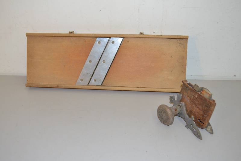 lot 180 image: Vintage doorknob & kraut cutter