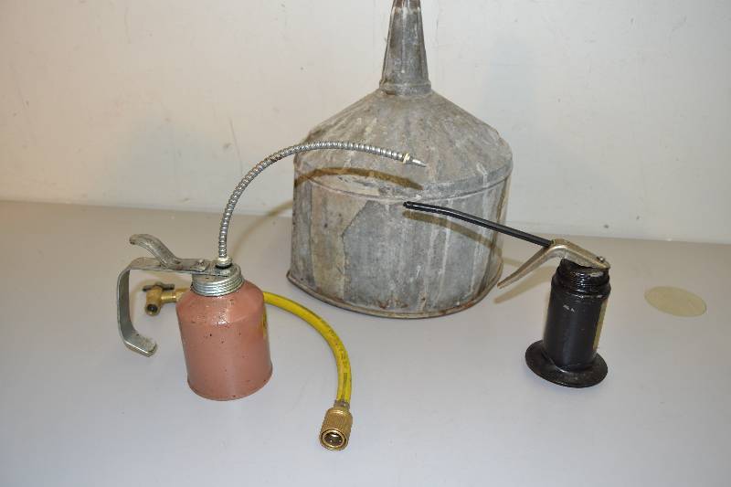 lot 242 image: Funnel Oil Cans