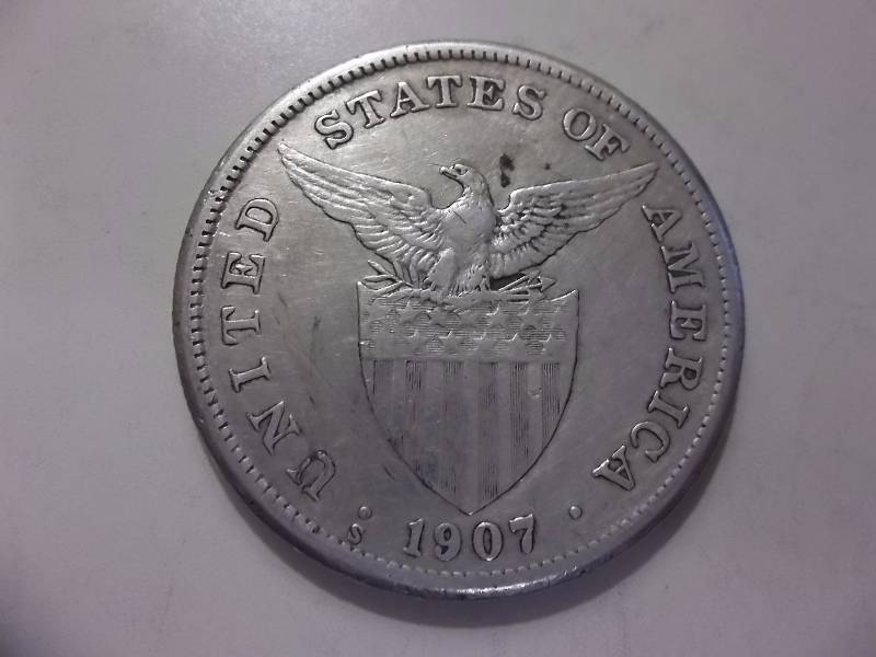 1907 One Peso From US Philippines (90%-1 Oz.)