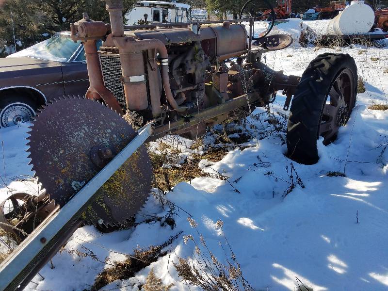 lot 16 image: International F-20 Tractor,Along with The Vintage saw Blade