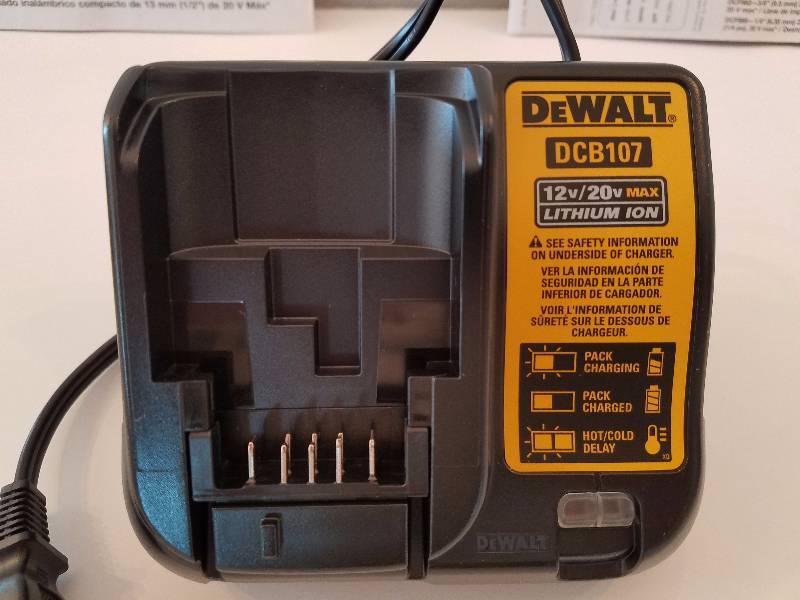 lot 24 image: DeWalt Cordless 12 20v MAX Lithium Ion  Battery Charger...Brand new