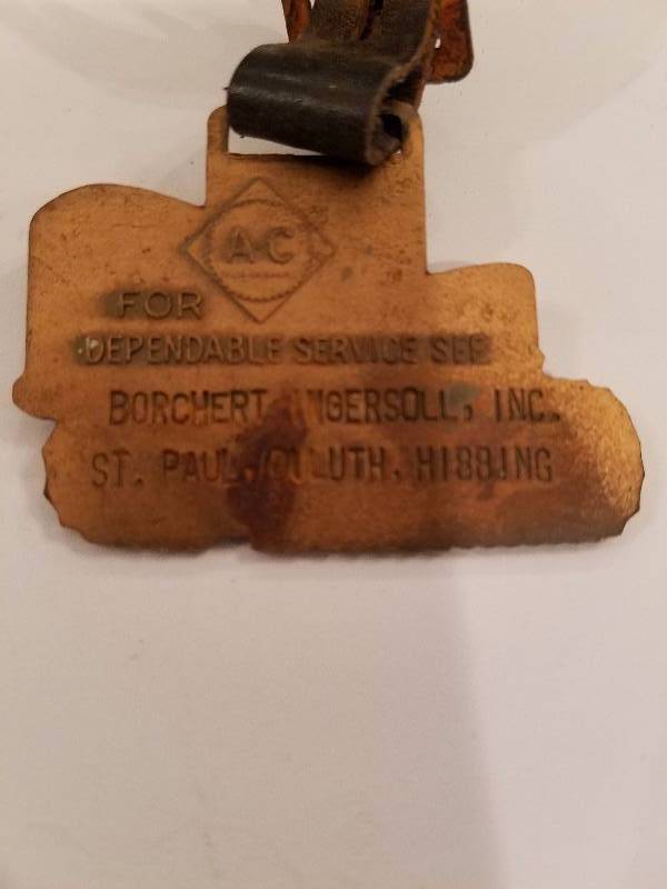 lot 20 image: Caterpillar Watch Fob
