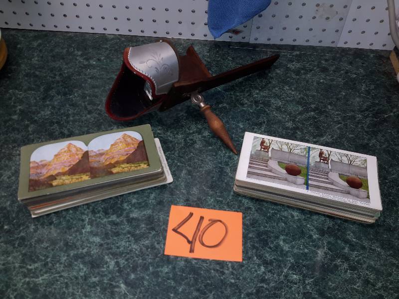lot 40 image: Stereo Scope.. Copywrite 1906.. About 75 of the Stereo Photos.