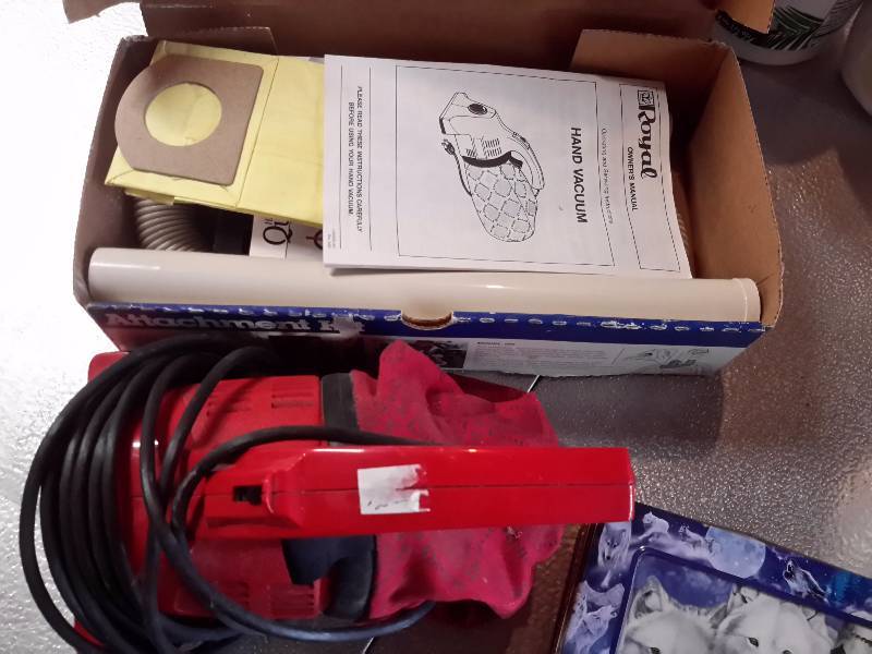 lot 90 image: Dirt Devil and attachments, ice cube trays, soaps, Large jug of Coconut oil (new), Dog dishes