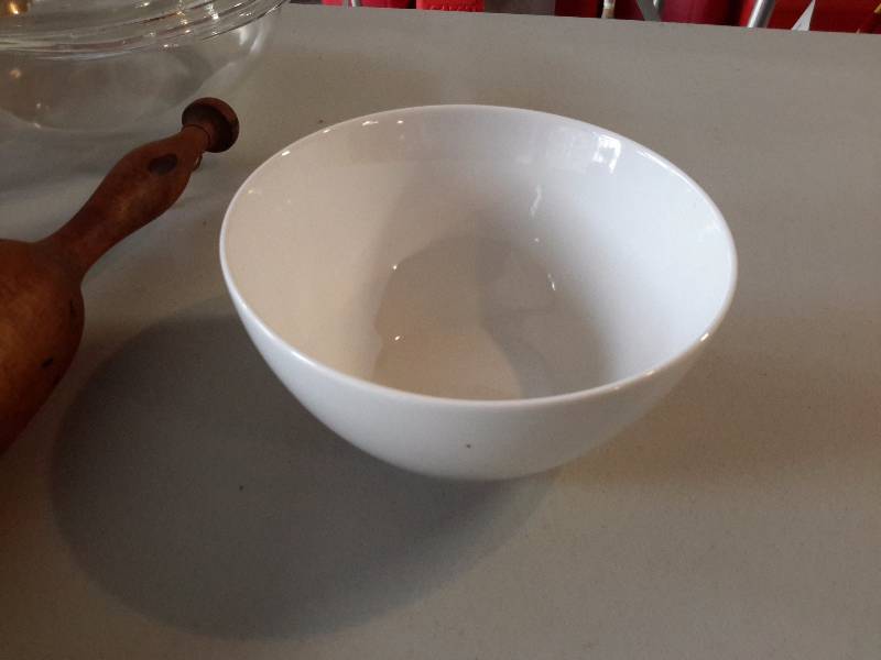 lot 78 image: 6, IKEA Wine Glasses, Wood potato masher, 6 nice IKEA cereal bowls, Nice cut glass serving bowl.. Other items as pictured