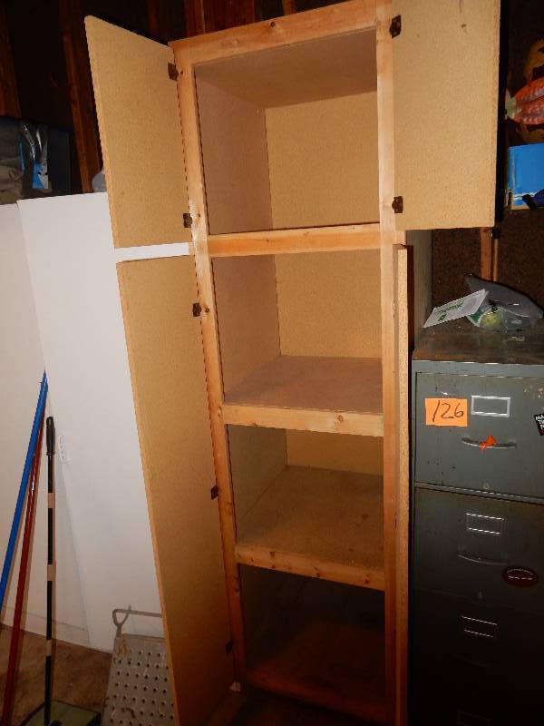 lot 124 image: Pressed wood Cabinet.
