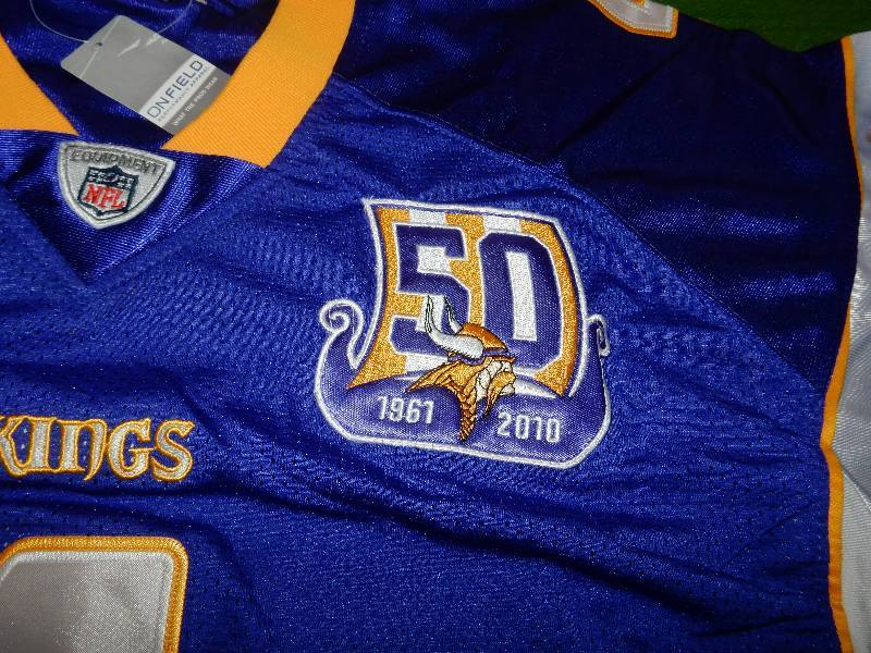 lot 129 image: Size 54 Favre Vikings Jersey..