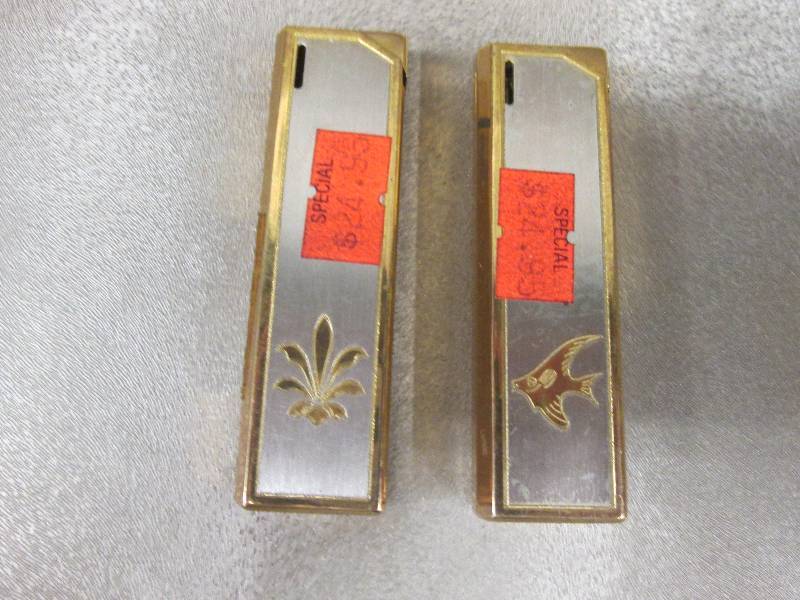 Lot of 2 Metal Lighters Retail $24....