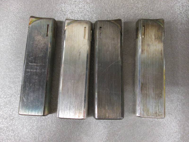 Lot of 4 Metal Lighters Retail $20....