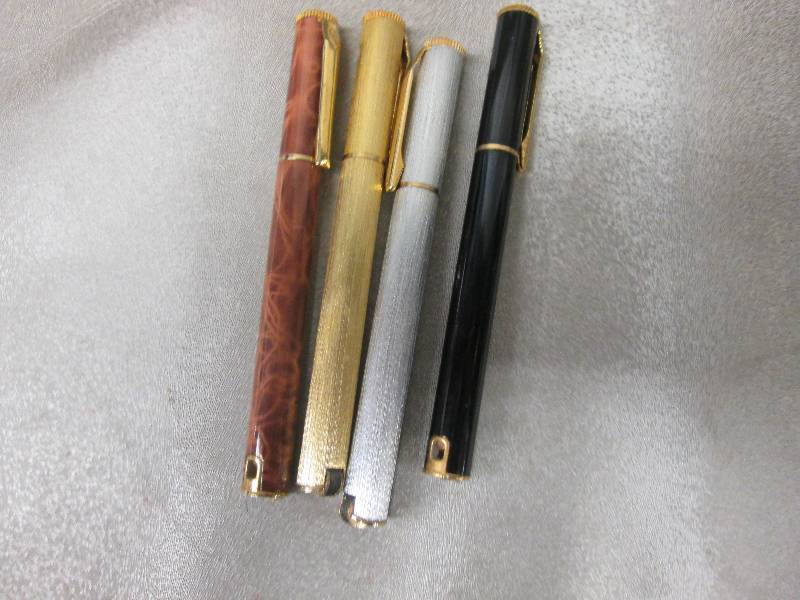 Lot of 4 Pen Style Refillable Light...