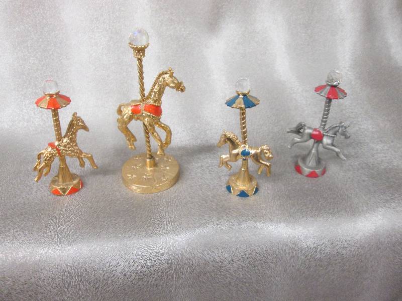 Lot of 4 Assorted Brass Carousel Fi...