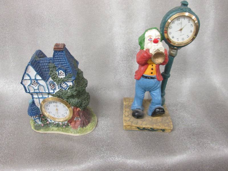 Lot of 2 Desk Figurine Clocks...