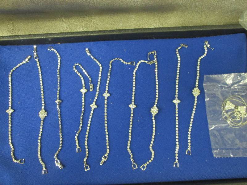 Rhinestoned Bracelets, One Necklace...