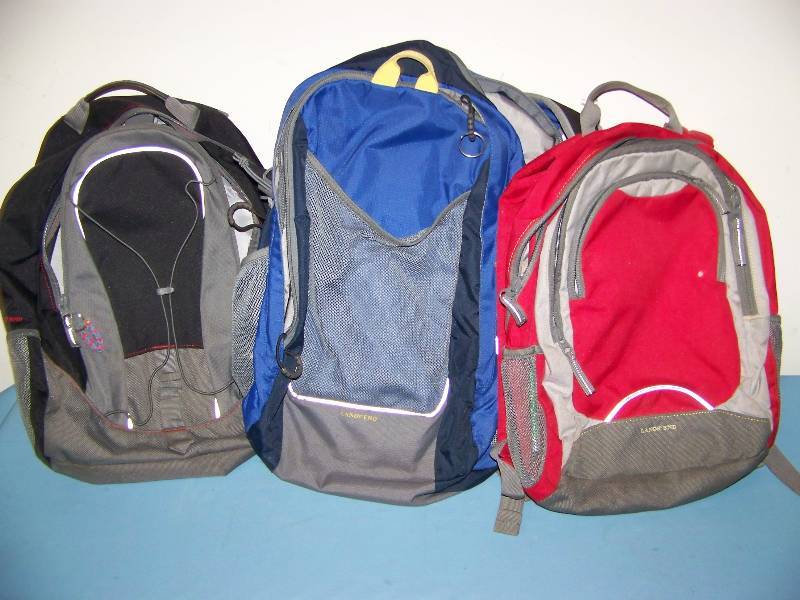 lot 44 image: (3) Kids Backpacks, (4) Lunch Bags and (1) Suitcase