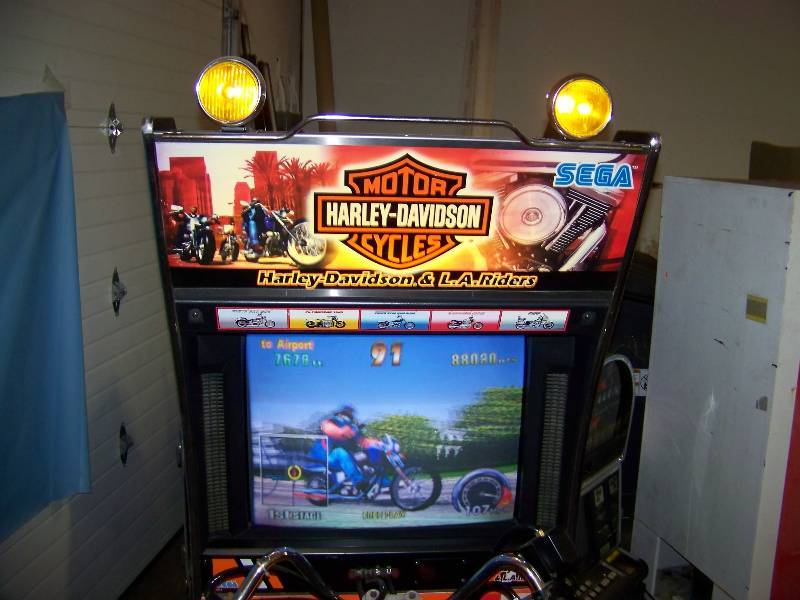 lot 3 image: Sega, Harley Davidson Motor Cycles, Sit-Down Driving, Video  Arcade Game