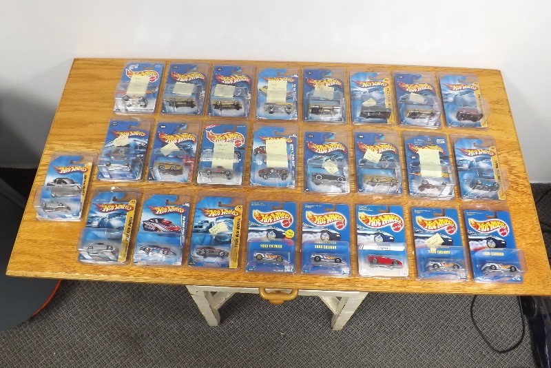 25 MINT on Card Assorted Higher End Hot Wheels in Protecters