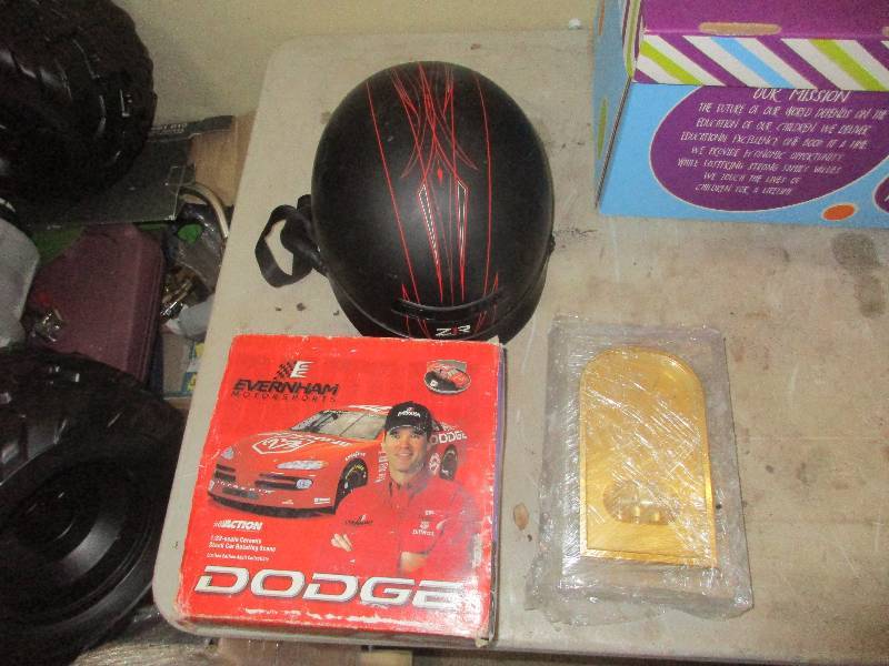 lot 38 image: XL helmet clock NASCAR model duct tape  camera