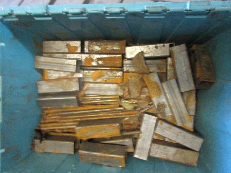 lot 55 image: tote of metal tubing