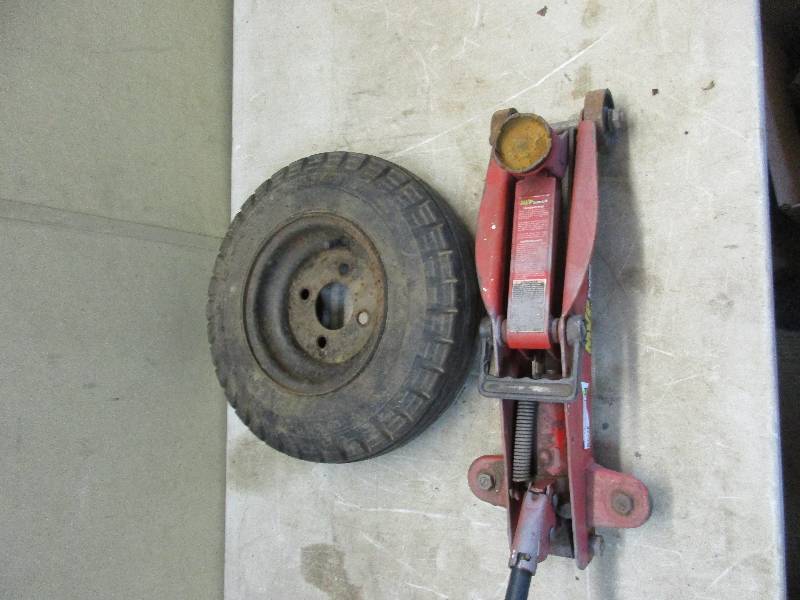lot 134 image: car jack and tire