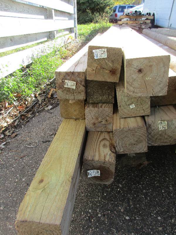 lot 140 image: 8 pressure treated 4x4s 14 total