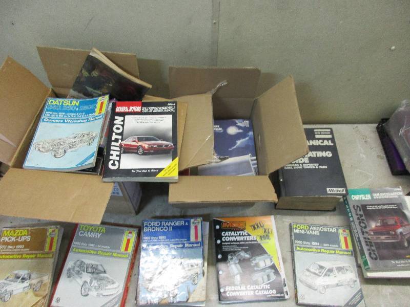 lot 145 image: assorted Chiltons and parts catalogs 3 boxes