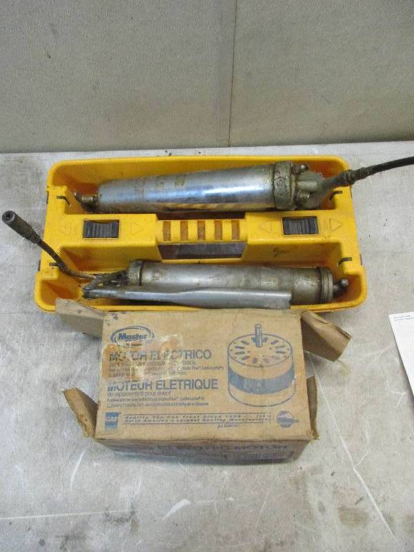 lot 192 image: 2 grease guns and electric motor