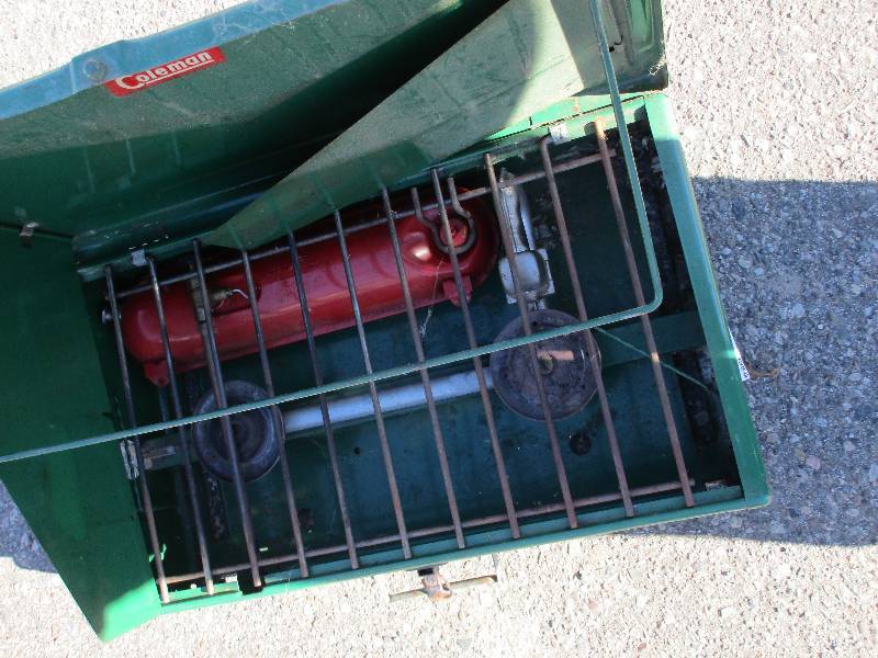 lot 199 image: Coleman camp stove and inflatable raft
