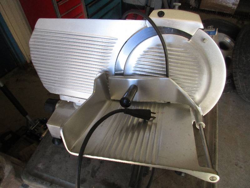 lot 229 image: Glove NSF meat slicer