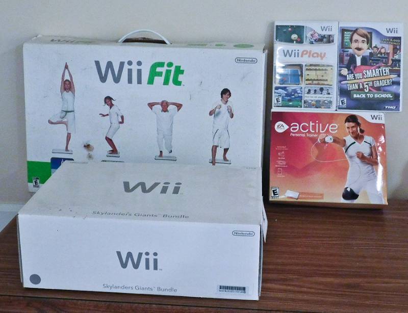 Wii console, wii fit, wii personal trainer