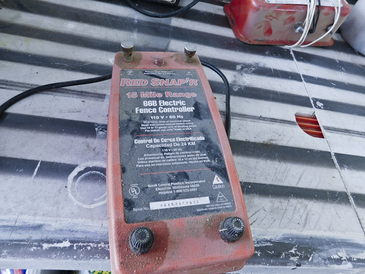 Red electric fence unit