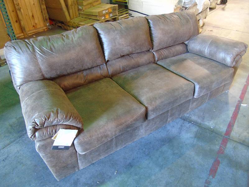 lot 30 image: Ashley Furniture Bladen Leather-Look Sofa - Coffee Color
