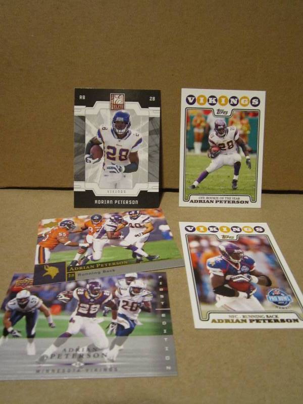 4 Adrian Peterson cards...