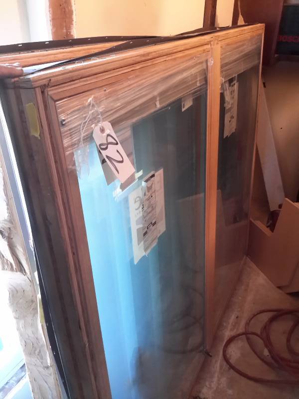 33 12 in x 57 18 h x 2,  EAGLE WINDOW, have blinds built in