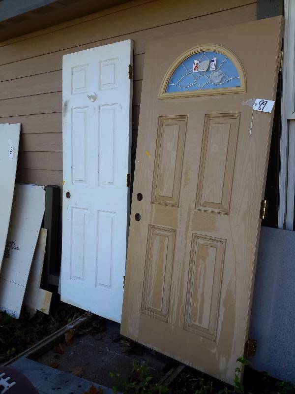 2 Doors. .1, Outside Entry door with 12 moon window.  1 interior door, 24in.
