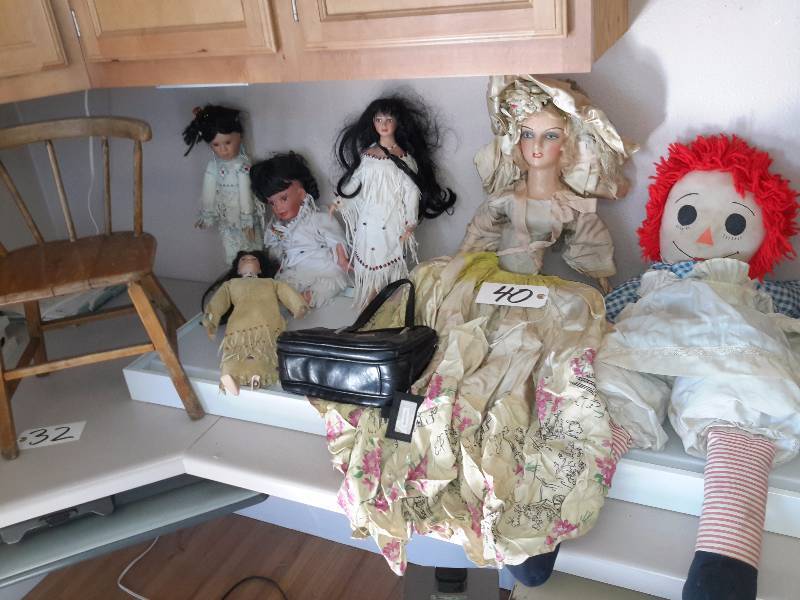 Lot of Dolls as shown. Small childs chair