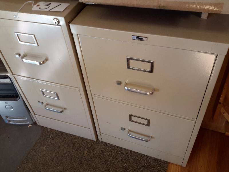 2 Metal 2 drawer file cabinets.. 1 letter size, 1 legal size