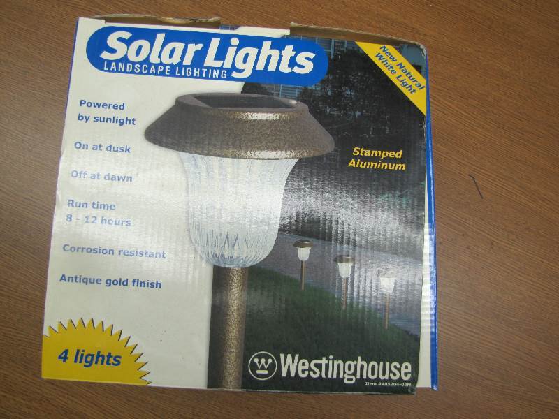 4 Used Solar Lights