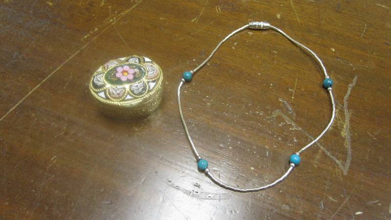 lot 28 image: Small metal micro mosaic pill box and silverturquoise anklet