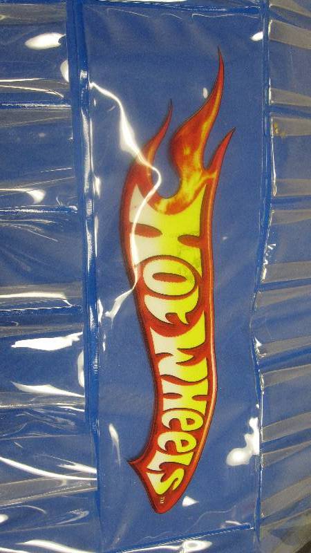 lot 37 image: Hot Wheels vinyl over door car holder