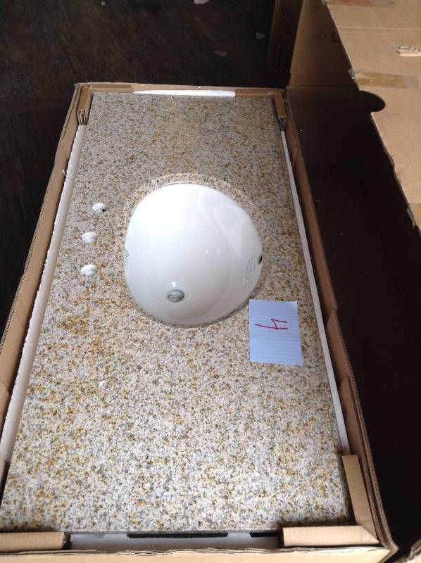 lot 4 image: Pegasus PE49682 49 in Granite Vanity Top with White Bowl and 8 in Spread beige ever used